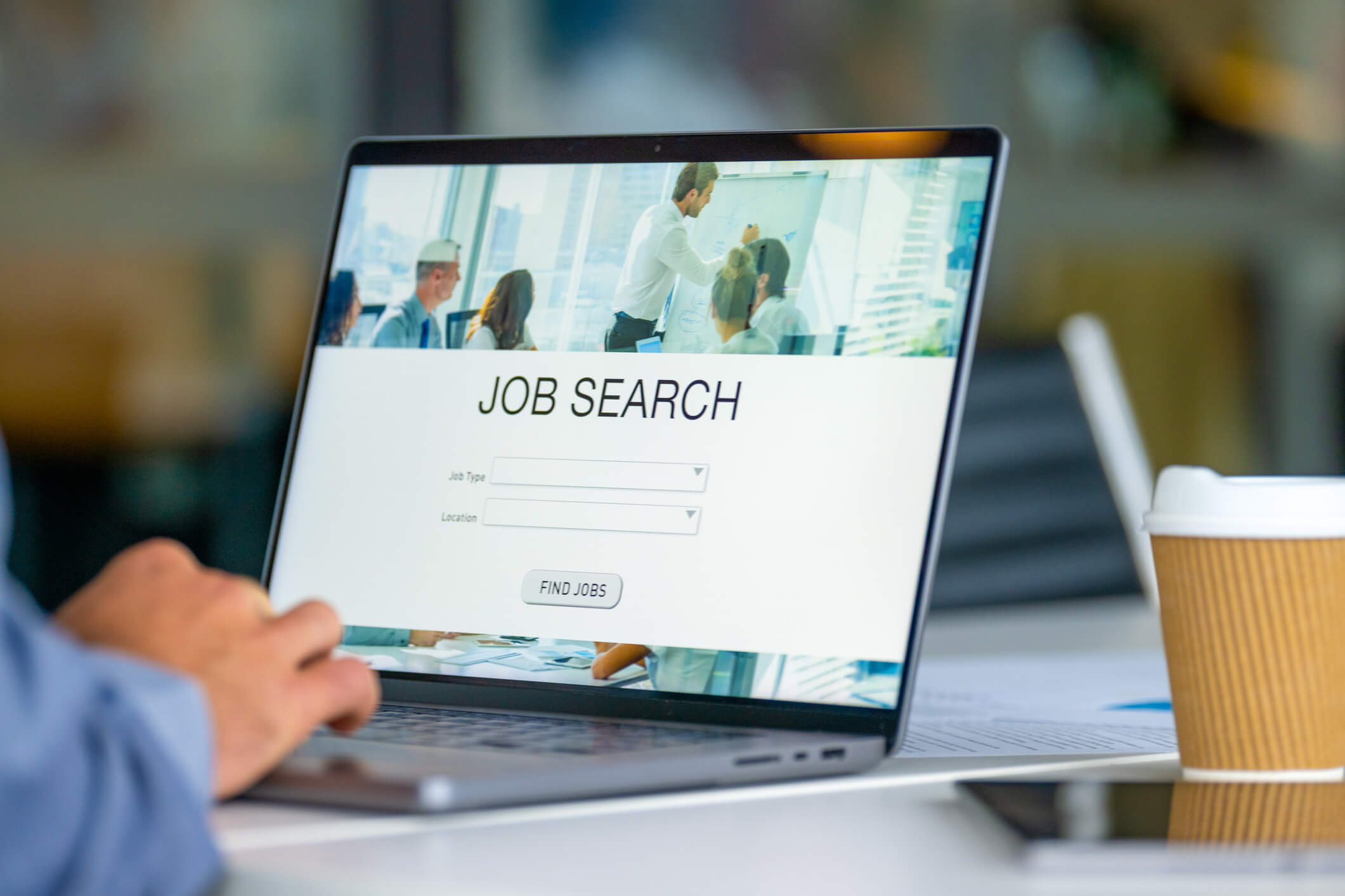Laptop displaying job search screen