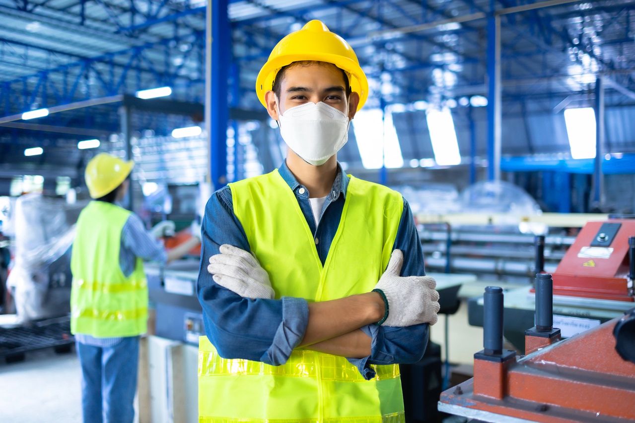 Industrial worker with yellow hard hat