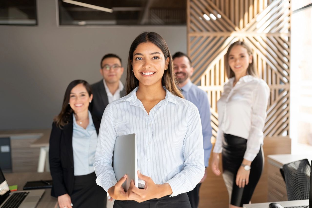 Group of colleagues in modern workspace